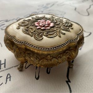 Small vintage jewelry/trinket box with pink rose and gold colored accents